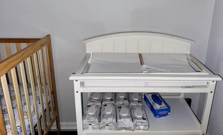 Little Roots infant changing station with wipes and care supplies